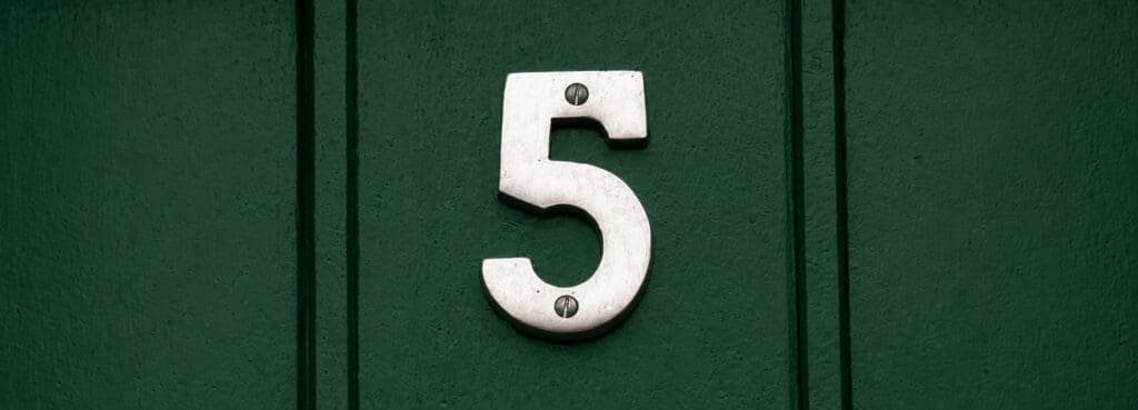 metallic-number-5-on-green-door