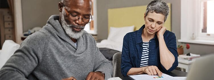 senior-couple-working-on-their-finances-at-home