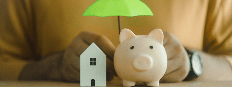 umbrella-over-house-and-piggy-bank