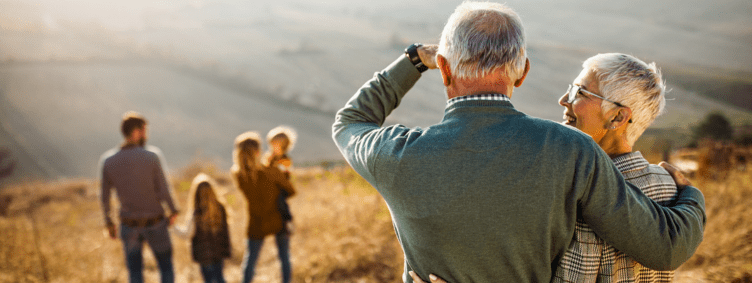 multigeneration three generations outside grandparents adult children parents grandkids