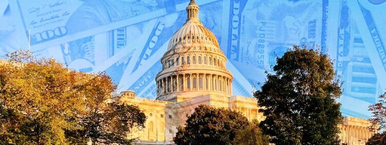 united-states-capitol-building-with-money-sky-background